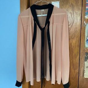 Light pink buttons up blouse with cute tie option
